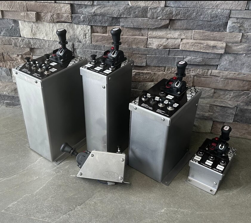Four in-house built truck equipment control towers in different sizes
